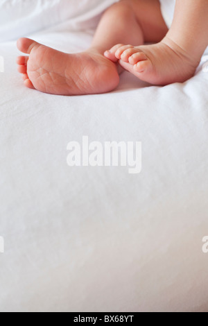 Small babies feet above large copy space Stock Photo
