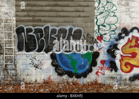 Graffiti Art along the B-Line trail in Bloomington, Indiana. Street art Midwest college town painting paint American Stock Photo