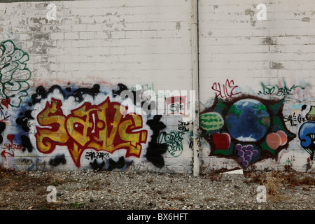 Graffiti Art along the B-Line trail in Bloomington, Indiana. Street art Midwest college town painting paint American Stock Photo