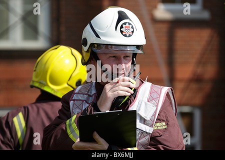 Incident commander at the scene of a large fire Stock Photo