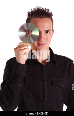 A young handsome man holding a cd or dvd. All isolated on white background. Stock Photo