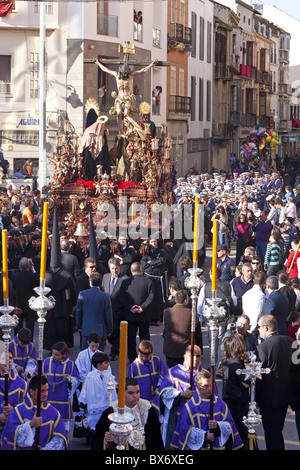 Religious float being carried through the streets during Semana Santa (Holy Week) celebrations, Malaga, Andalucia, Spain, Europe Stock Photo