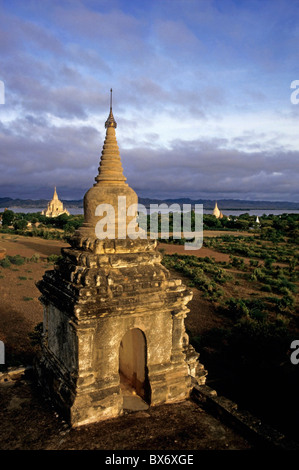 Gawdawpalin Temple and historic pagodas at sunrise along the Irrawaddy River, Bagan, Burma. Stock Photo