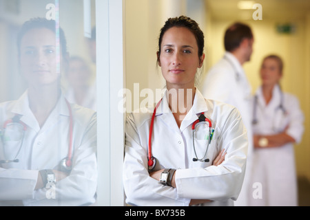 Doctor is looking into the camera Stock Photo - Alamy