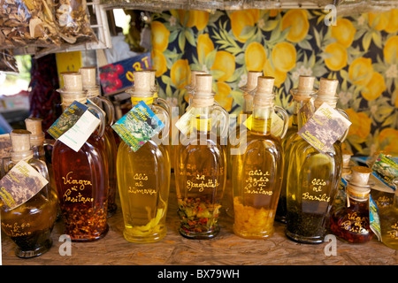 Olive oil for sale on market stall near Positano, Amalfi Coast road, Campania, Italy, Europe Stock Photo