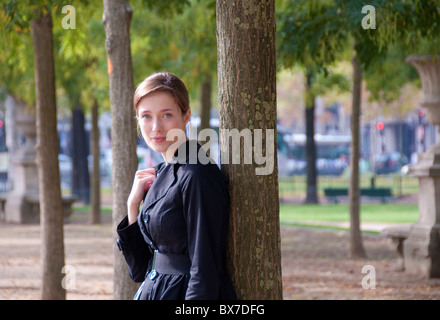 Portrait of woman in Paris park Stock Photo