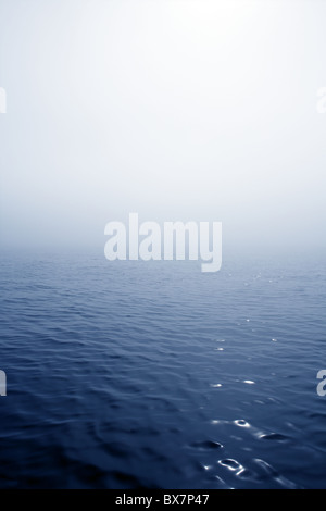 Blue fog sea in a foggy day with low ocean visibility Stock Photo