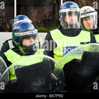 Metropolitan riot police preparing for a student demonstration in London. Stock Photo