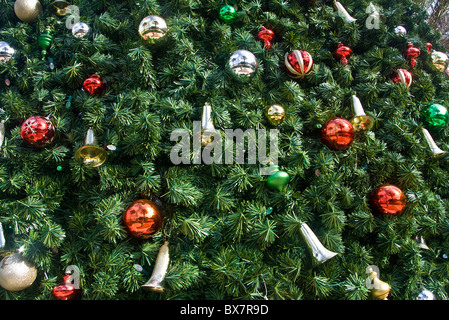 Closeup of several ornaments on a large Christmas Tree on display in the 'square' of Lakewood Ranch, FL Stock Photo