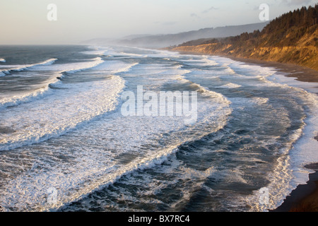 Late afternoon surf coming into Agate Beach, Patrick's Point State Park, CA from the cliff overlooking Agate Beach Stock Photo