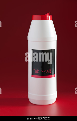 Open Container Salt table salt with dark background close up shot Stock Photo - Alamy