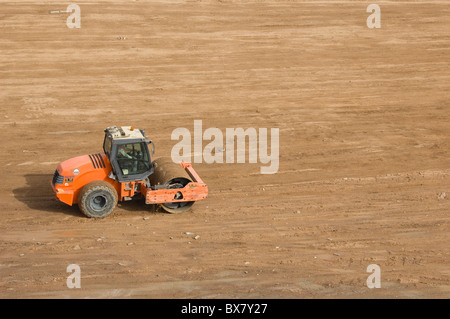 Vibratory soil compactor. HAMM 3000 series in action. Stock Photo