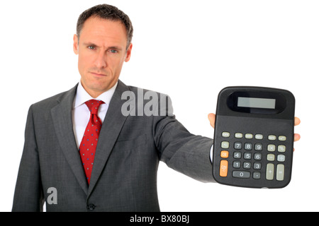 Serious businessman holding a calculator. All on white background. Stock Photo