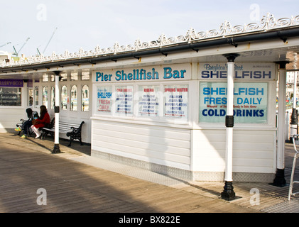 A traditional shellfish bar on Brighton Pier in winter Brighton Sussex England Europe Stock Photo