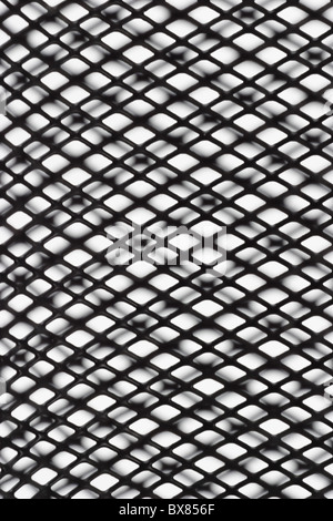 Abstract black wire mesh pattern with shadow on white background Stock Photo