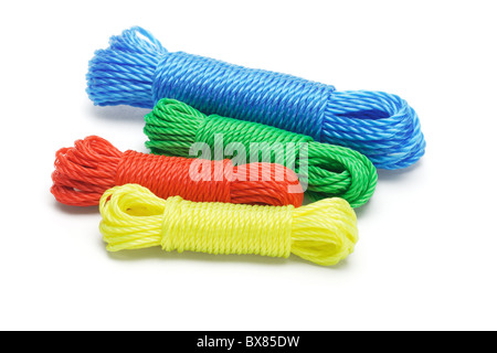Bundles of colorful nylon ropes on white background Stock Photo