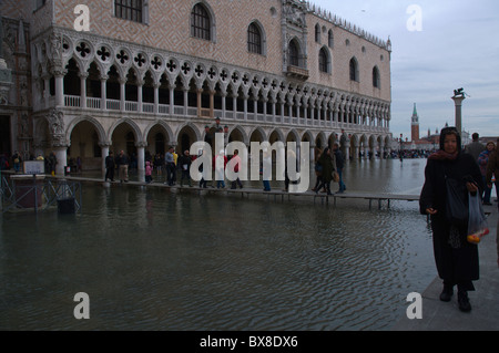 People in front of Palazzo Ducale during high tide floods San Marco district Venice the Veneto northern Italy Europe Stock Photo