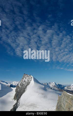 The Valais Alps from high on the Allalinhorn, Switzerland Stock Photo