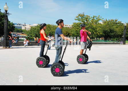 Sightseer tourists on Segway personal transporters in Washington, DC. Stock Photo