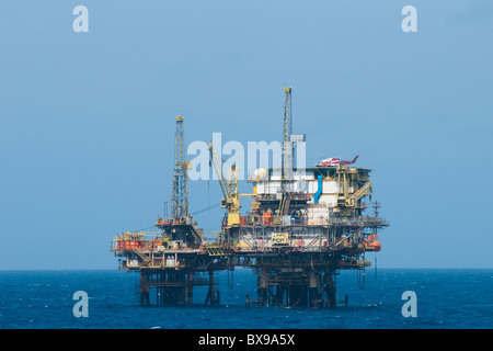 PCP-1 oil rig from Petrobras brazilian oil company. Helicopter landed on helipad. Stock Photo