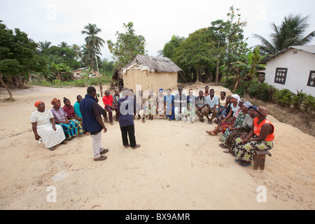 Villagers attend a community meeting in the town of Kakata, Liberia, West Africa. Stock Photo