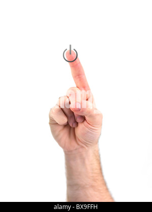 A hand pushing a power on button Stock Photo