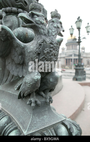 Fragment of the monument to Nicholas I on St Isaac's Square. eagle autocracy crown bronze monument autocracy Stock Photo