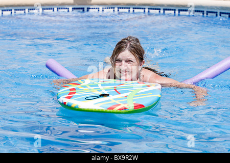 Senior Lady (60s) Learning to Swim Stock Photo