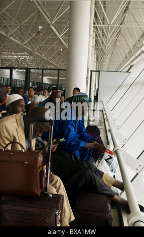 African passengers waiting to board the airplane in Bole international airport in Addis Ababa, Ethiopia. Stock Photo