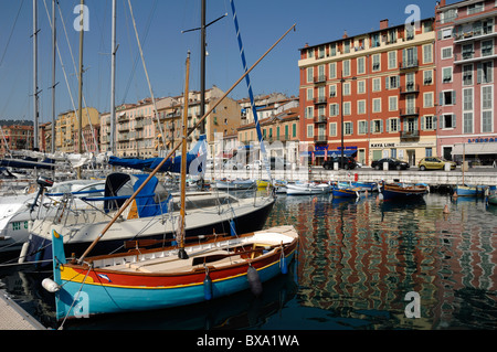 Old Port, Quaiside, Harbour or Harbor and Painted Fishing Boat, Nice, Côte d'Azur, France Stock Photo