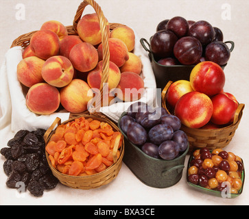 STONE FRUITS: PEACHES; AVOCADO; MANGO; SWEET ANGELANO PLUMS; NECTARINES; PRUNE PLUMS; DRIED APRICOTS; PRUNES AND CHERRIES Stock Photo