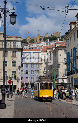 Portugal, Lisbon, Praca da Figueira, with a tram and the Sao Jorge castle above Stock Photo