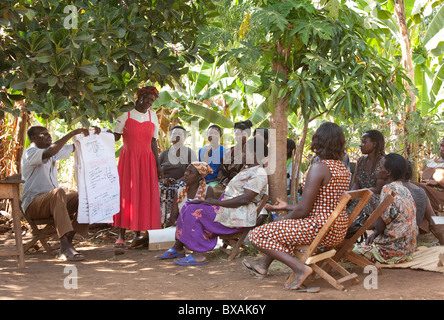 Villagers attend a community meeting in Buwanyanga Village - Sironko, Eastern Uganda, East Africa. Stock Photo