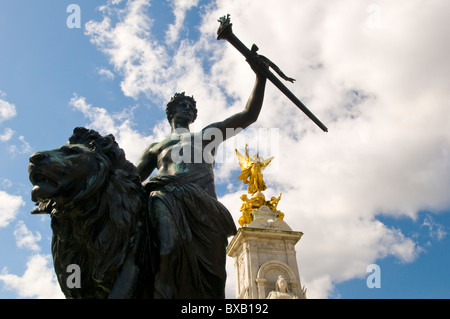 Victoria Memorial Outside Buckingham Palace With Bronze Statue of a Man Representing Progress Seated on a Lion Stock Photo