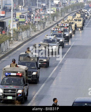 Rangers and police convoy patrol in city during flag march for maintain law and order situation during Moharam-ul-Haram Stock Photo