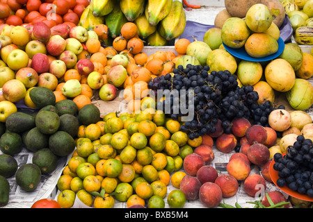 Assorted fruit in market stall Stock Photo