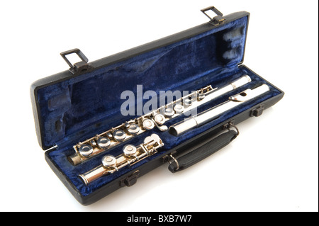 Black case with silver flute in blue velvet Stock Photo