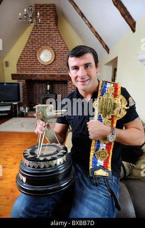 Boxing champion Joe Calzaghe at home near Blackwood, South Wales. Pictured with The World Super Middleweight Championship belt a Stock Photo