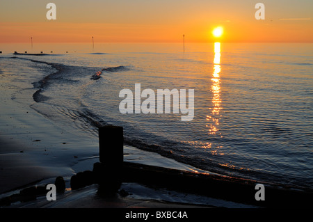 West Norfolk coast, November sunset over the Wash from Hunstanton beach Stock Photo