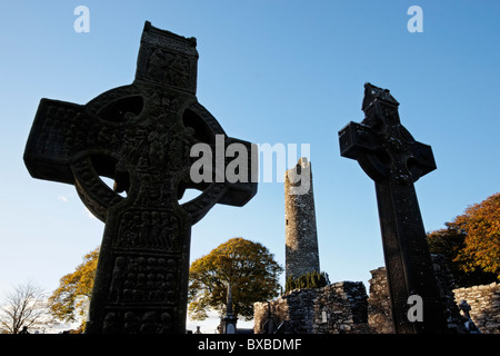 Muiredach's Cross and the Round Tower at Monasterboice, County Louth, Leinster, Ireland. Stock Photo
