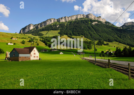 Farm house in the canton of Appenzell, Alpstein Mountains in the back, Canton Appenzell, Switzerland, Europe