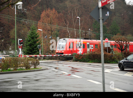 train on level crossing, Nassau Germany Stock Photo