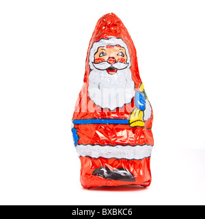 Foil wrapped Chocolate Santa isolated on white. Stock Photo