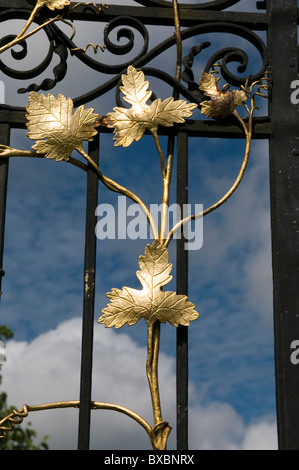Ornamental golden leaf design on a gate in St.Fagans castle gardens. Stock Photo