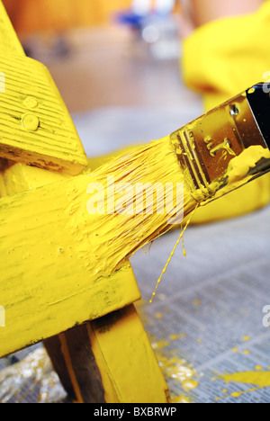 Painting with a paint brush Stock Photo