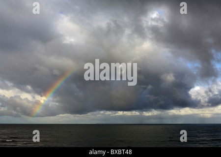 Rainbow over Lundy Island and Bideford Bay in the Bristol Channel off the North Devon Coast, England. Stock Photo