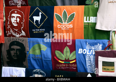 T-shirts with Che Guevara and coca leaves in form of Adidas logo for sale outside shop in tourist market, Calle Linares, La Paz, Bolivia Stock Photo
