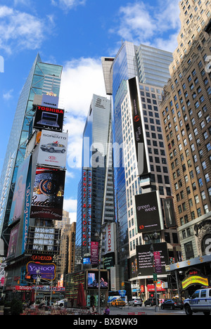 Skyscrapers with billboards at One Times Square, site of the annual new years ball drop in New York City. April 18, 2010. Stock Photo