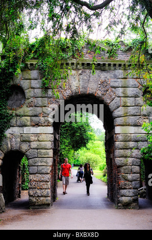 Photo shows the Ruined Arch, a folly in Kew Gardens, Richmond, Surrey, UK Stock Photo