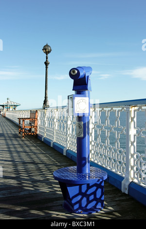 A pay telescope for public use on the pier at Llandudno, North Wales Stock Photo